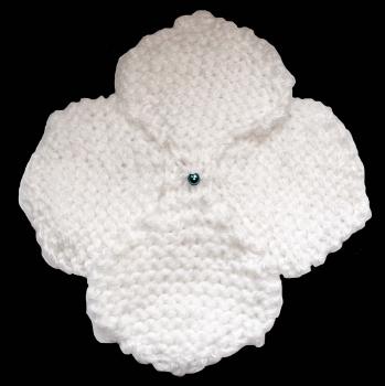 Hand knitted brooch in white